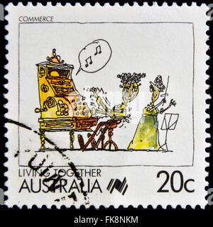 Australien - ca. 1988: Eine Briefmarke gedruckt in Australien zeigt Living Together, Handel, ca. 1988 feiern Stockfoto