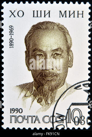 UdSSR - CIRCA 1990: Briefmarke gedruckt in USSR zeigt Porträt von Ho Chi Minh - Präsident der Republik von Vietnam, circa 1990 Stockfoto