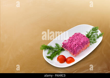 Hering unter einem Pelzmantel Stockfoto