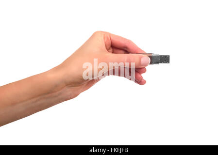 Flash-Laufwerk in der Hand auf einem weißen Hintergrund. Stockfoto