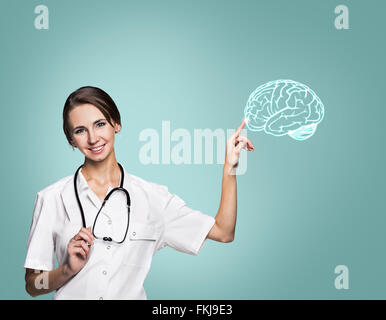 Ärztin in einheitlicher Touch malte Gehirn Stockfoto