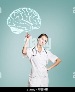 Ärztin in einheitlicher Touch malte Gehirn Stockfoto