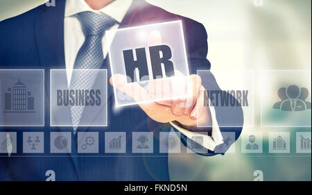 Geschäftsmann auf Knopfdruck Human Resources-Konzept. Stockfoto