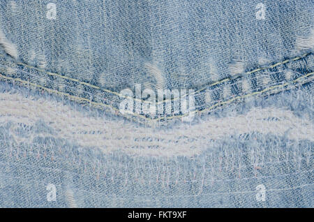 Blau verblasst zerrissene Jeans, Nahaufnahme Stockfoto