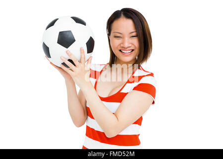 Junge Frau Holding Fußball Stockfoto