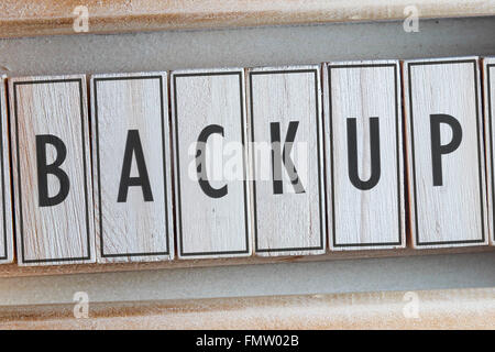 Backup auf Holz geschrieben Wort Stockfoto