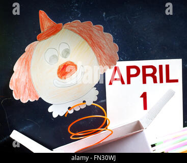 Aprilscherze Tag Symbol Konzept mit Clown auf Tafel Stockfoto