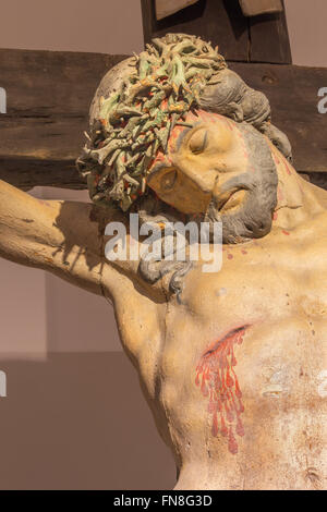 BANSKA STIAVNICA, Slowakei - Februar 2015: Die Details der geschnitzte Statue Christi am Kreuz als Teil des barocken Kalvarienberg Stockfoto