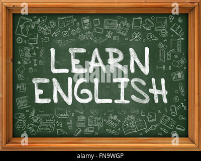 Lernen Sie englisches Konzept. Grünen Tafel mit Doodle Symbole. Stockfoto