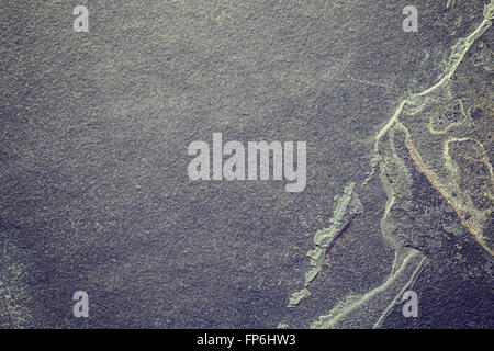 Dunklen Schiefer, Stein Hintergrund geknackt. Stockfoto