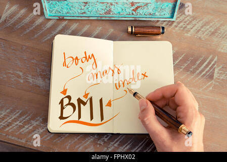 Handgeschriebener Text BMI BODY MASS INDEX, Business-Erfolg-Konzept Stockfoto