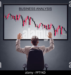 Businesman mit dem Handel der Börse in Wirtschaftskrise Stockfoto