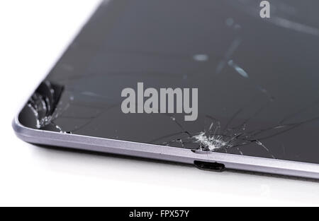 Eine gebrochene Tablet-PC als detaillierte Nahaufnahme auf neutralen weißen Hintergrund Stockfoto