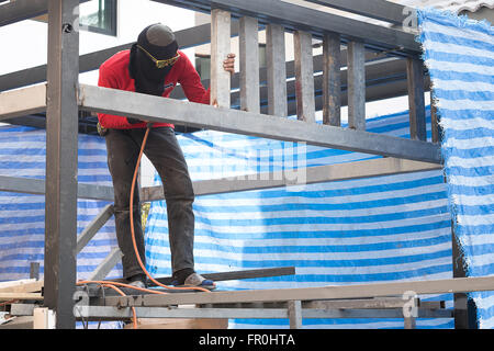 Arbeit an der Baustelle von Thailand Stockfoto