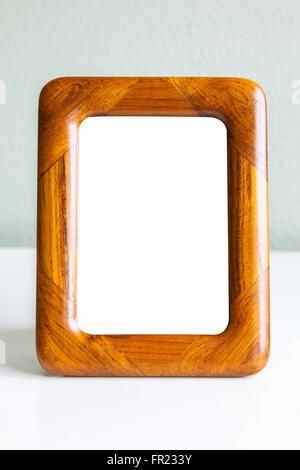 Foto von Vintage Teak Holz Mock-up Rahmen. Stockfoto