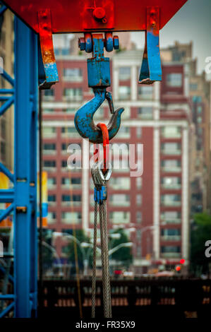 Haken Sie am Kran, Baustelle, New York City, USA. Stockfoto