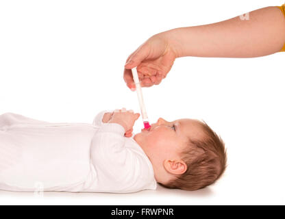 Eltern, Baby Calpol für Kinderkrankheiten Ausschnitt Stockfoto