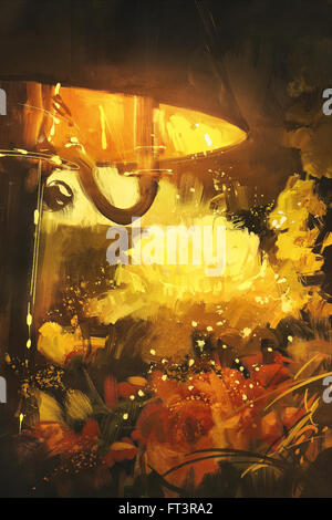 schöne Blumen und leuchtende Orange Lampe in der Nacht Stockfoto