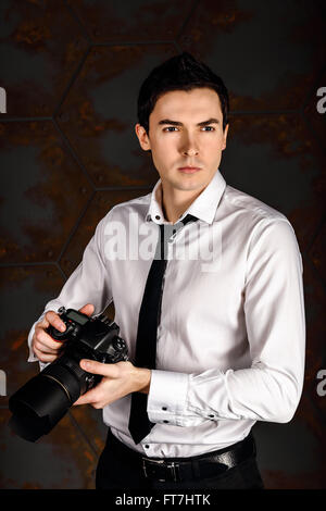 Professioneller Fotograf für Schuss bereit Stockfoto