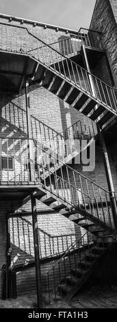 alte Treppe-Brandschutz an der Wand Ray Boswell Stockfoto