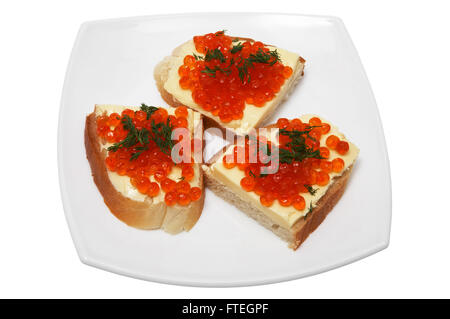 Sandwiches mit rotem Kaviar auf einem weißen Teller Stockfoto