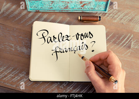 Handgeschriebener Text Parlez Vous Francais? "in Französisch - Übersetzung: sprechen Sie Französisch? als Firmen-Konzept-image Stockfoto