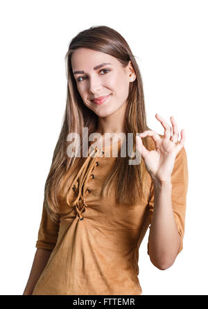 Junge schöne Frau zeigt OK Sign. Stockfoto