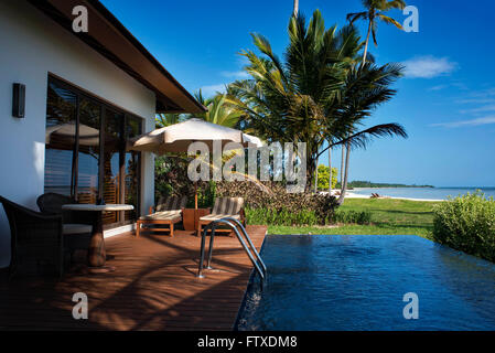 Swimming Pool und außen Luxus-Villa in The Residence Hotel in Sansibar Insel einen semi-autonomen Teil von Tansania in East Afr Stockfoto