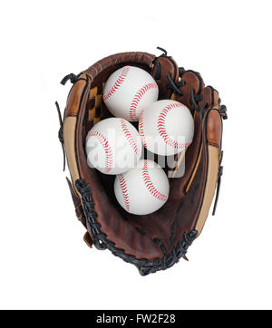 Baseball Handschuh mit vier Baseballs auf weißem Hintergrund. Stockfoto