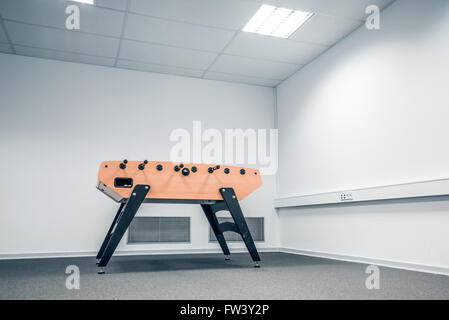 Foosball table in a large office room Stockfoto
