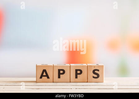 Apps-Schild an einem Holztisch im hellen Licht Stockfoto