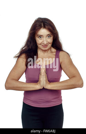Mittleren Alters Frau Danke, Namaste, Sportarten auf weißem Hintergrund Stockfoto