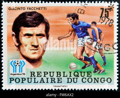 Kongo - CIRCA 1978: Eine Briefmarke gedruckt im Kongo gewidmet der WM in Argentinien 1978 zeigt Giacinto Facchetti, ca. 1978 Stockfoto