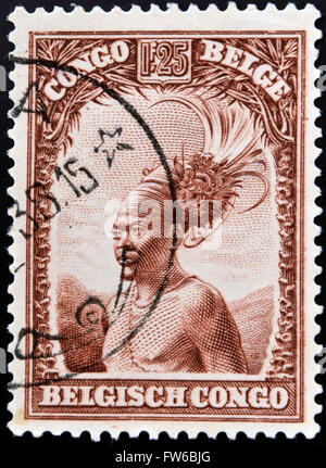 Belgisch-Kongo - ca. 1942: Eine Briefmarke gedruckt in Belgisch-Kongo zeigt Kopf von einem einheimischen Männer, ca. 1942 Stockfoto