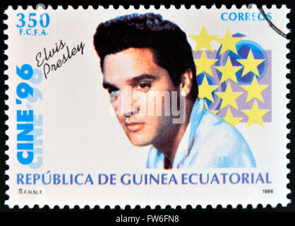 ÄQUATORIAL GUINEA - CIRCA 1996: A Briefmarke gedruckt in Guinea gewidmet Kino zeigt Elvis Presley, ca. 1996 Stockfoto