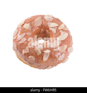 Donut in den Blütenblättern von Mandeln und Zuckerguss Stockfoto