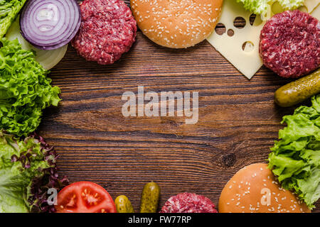 Hamburger, Hintergrund mit textfreiraum für Rezept zu machen. Wohnung von oben zu legen. Stockfoto