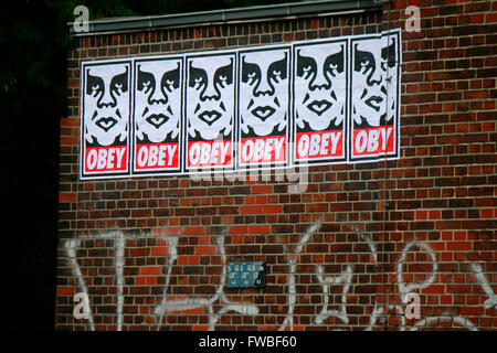 Ein Graffiti des Street Art Kuenstlers Shepard Fairey aus der "Andre the Giant"-Serie, Juni 2015, Berlin-Wedding. Stockfoto