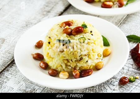 Pongal/Ponkal Linsensuppe Reis Tamil Nahrung aus Südindien Stockfoto