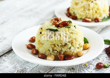 Pongal/Ponkal Linsensuppe Reis Tamil Nahrung aus Südindien Stockfoto