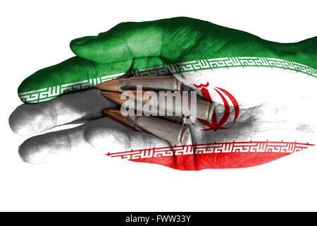 Flagge des Iran überlagert die Hand eines erwachsenen Mannes hält vier Kugeln. Konzeptbild für Krieg, Gewalt, Konflikte. Bild-isolat Stockfoto