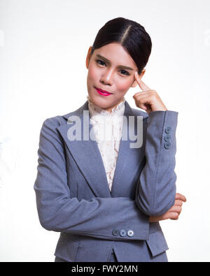 Business-Frau im Anzug sind einige Ideen nachzudenken. Stockfoto