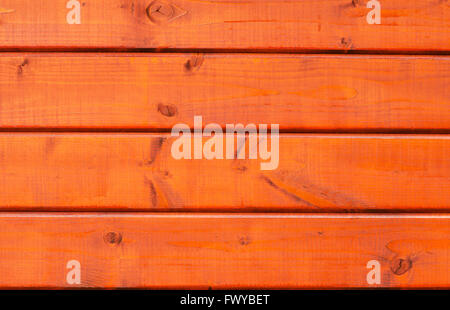 Textur von vier roten Holzplanken Wand. Stockfoto