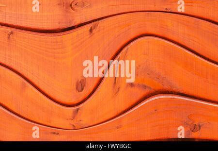 Textur von vier roten Holzplanken Wand. Stockfoto