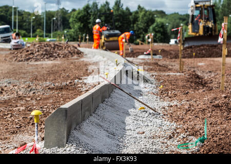 Vermessungsingenieure arbeiten an neuen Straßenbau Stockfoto