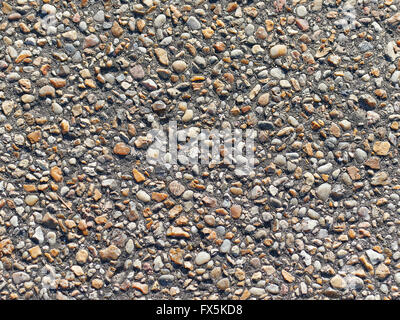 Asphalt Textur mit unterschiedlicher Größe von Steinchen drin Stockfoto