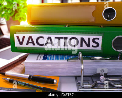 Green Office Ordner mit Inschrift Urlaub. Stockfoto