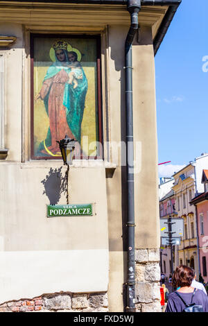 Podzamcze Street, Gemälde von St Mary und Jesus an der Wand, Krakau, Polen Stockfoto