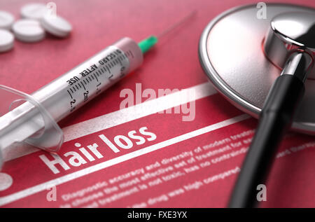 Haarausfall - Diagnose gedruckt auf roten Hintergrund. Stockfoto