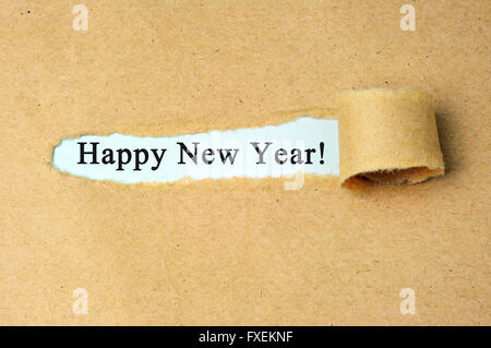 Zerrissenes Papier mit dem Text "Happy New Year!". Stockfoto